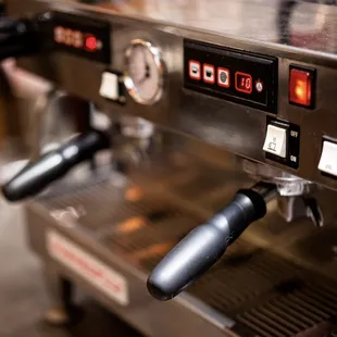 a close up of a coffee machine