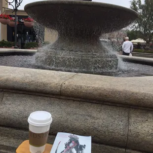 Overcast weather, coffee, a book and the sound of water = Awesomeness....