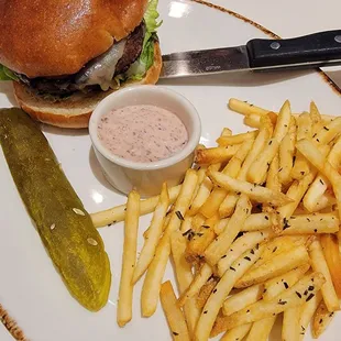 Burger with fries and special sauce I didn't care for