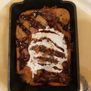 Warm chocolate chip cookie with vanilla bean ice cream