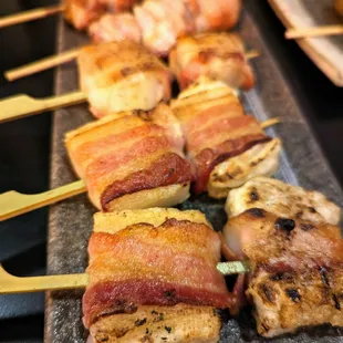 Bacon Mochi ($5.00 per skewer) and Bacon Scallop ($6.50 per skewer).