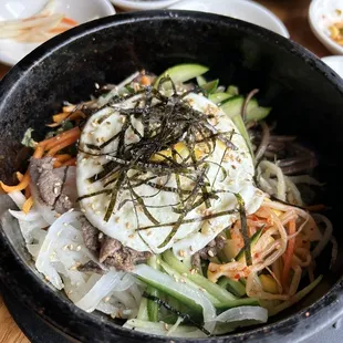 a bowl of food on a table