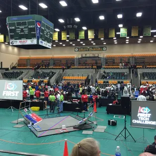 The teams are getting ready, getting judged and sharing trade secrets in the pit!