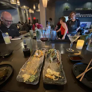Creamy crunchy roll (left), dragon roll (right). Both SO good. Rachel (the bartender in the red) is the star of the show!!!!