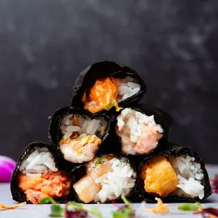 Bottom - Spicy tuna, scallops, shrimp tempura Middle - hamachi Top - salmon