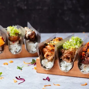 Left Shrimp tempura Pork belly Wagyu meatball  Right Chicken thigh Wagyu  toro Wagyu beef