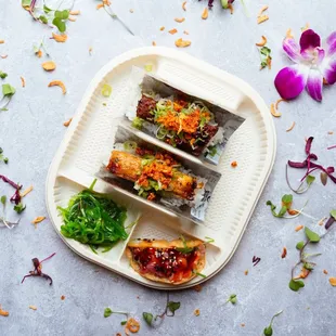 Chicken meatball - chili garlic crunch - scallions Wagyu meatball - chili garlic crunch - scallions Seaweed salad, tuna sushi taco