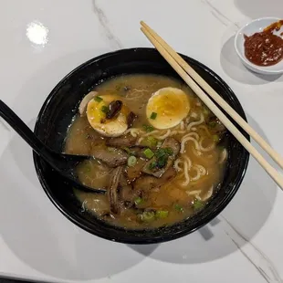 Beef Ramen with hot chili paste on the side.