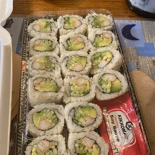 a tray of sushi rolls