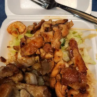 a plate of chicken and rice