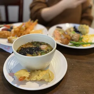 a bowl of soup on a plate