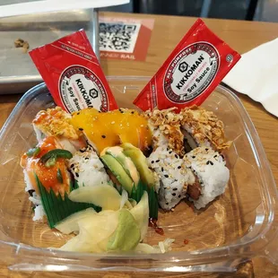 a sushi dish in a plastic container