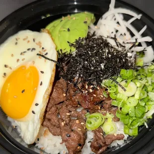 Nori Bulgogi Bowl with Egg, Avocado, dried Seaweed , Green Onion, Onion and sesame seeds