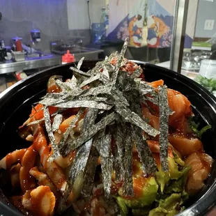 Cupid added salmon, squid salad, and masago