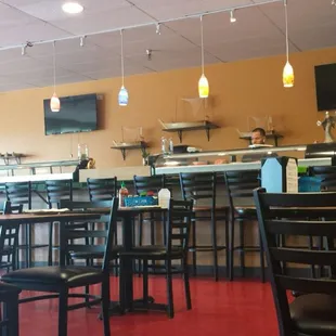 Simple clean decor, although the seating looks like it would be pretty crowded if well populated.