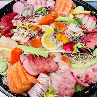 a close up of a plate of sushi