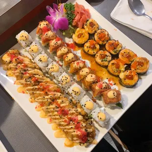 L-R: TNT Roll Caliente Roll Nori Thai Spicy Tuna Roll phoenix roll