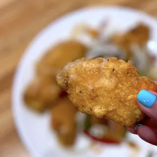 Hot...meaty...hella juicy wings with an airy crunch!