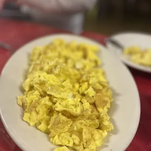 a plate of scrambled eggs