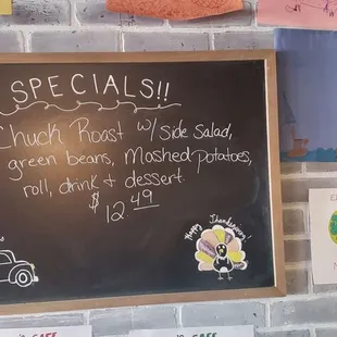 a menu on a chalkboard