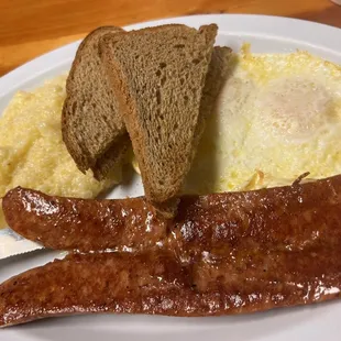 Country Smoked Sausage w/grits, medium eggs &amp; wheat toast ($9.49).  The sausage was tasty!