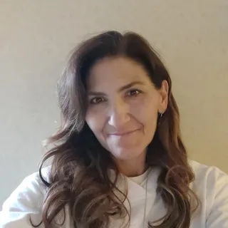 Suzanne G.