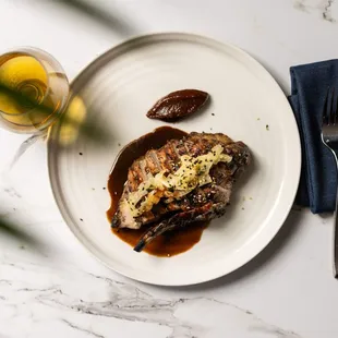 a plate of food on a marble table