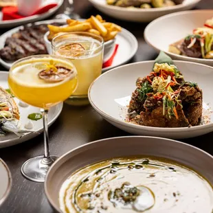 a table full of food and drinks