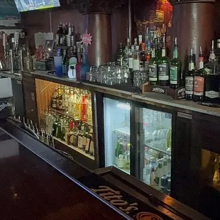 a bar with a lot of bottles of liquor