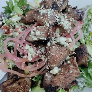 Steak salad. Ordered medium