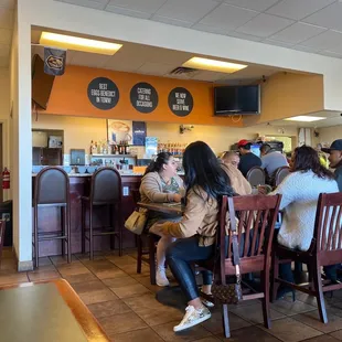 a group of people sitting at a table
