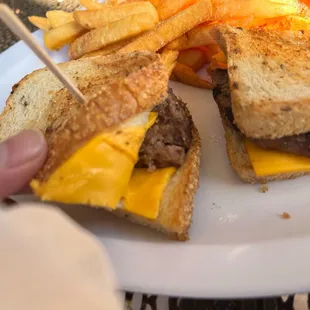 Why does Norm&apos;s make patty melts without melted cheese? Why Kraft cheese?