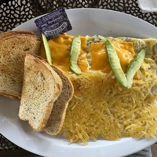 Build your own omelette, cheese, avocado, bacon, and onions.