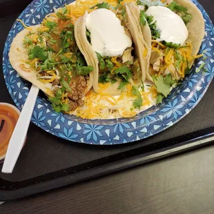 Beef taco, 2 tacos with seasoned chicken and sour cream