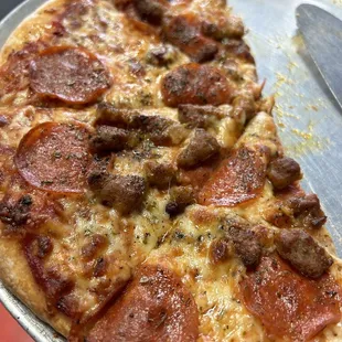 a slice of pepperoni pizza