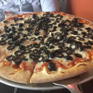 Medium pizza with black olives