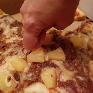 Knuckle size pineapple chunk that does NOT belong on pizza!