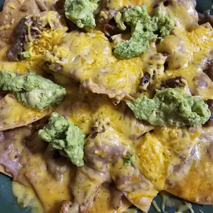 Normitas Nachos with mixed chicken/beef fajita meat