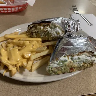Cali Burrito with carne asada and fries with melted cheese.