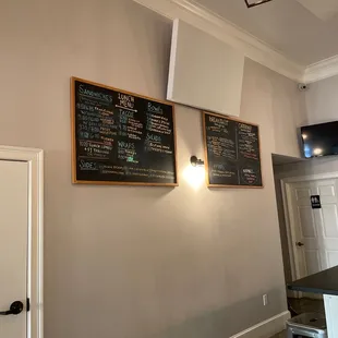 menus on the wall of a restaurant