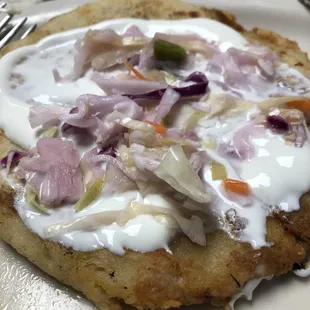 Pork pupsa with crema and slaw