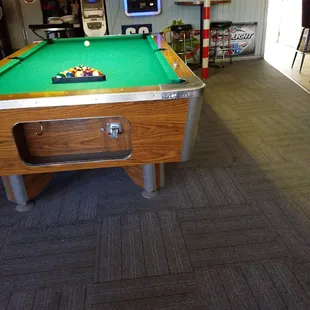 8ft pool table, atm, jukebox.