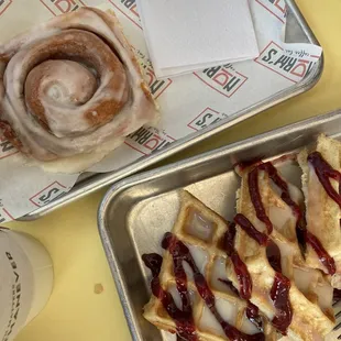 Cinnamon Roll and Waffle with white sauce