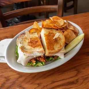 Turkey Club served with homemade potato chips