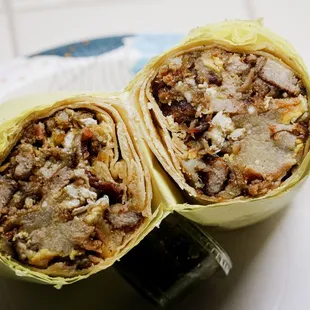 Sausage and bacon breakfast burrito.