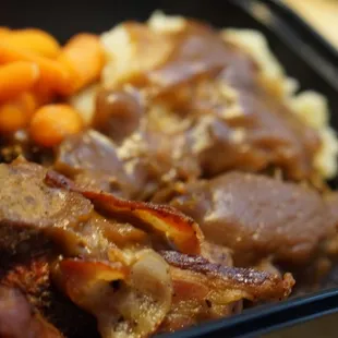 meat, potatoes, carrots, and gravy