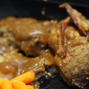 a plate of meat and vegetables