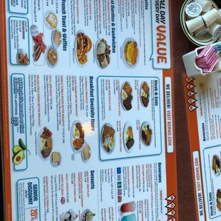 a menu with a variety of food items