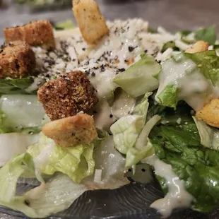 a salad with croutons and cheese