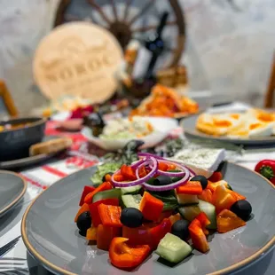 a salad on a plate on a table